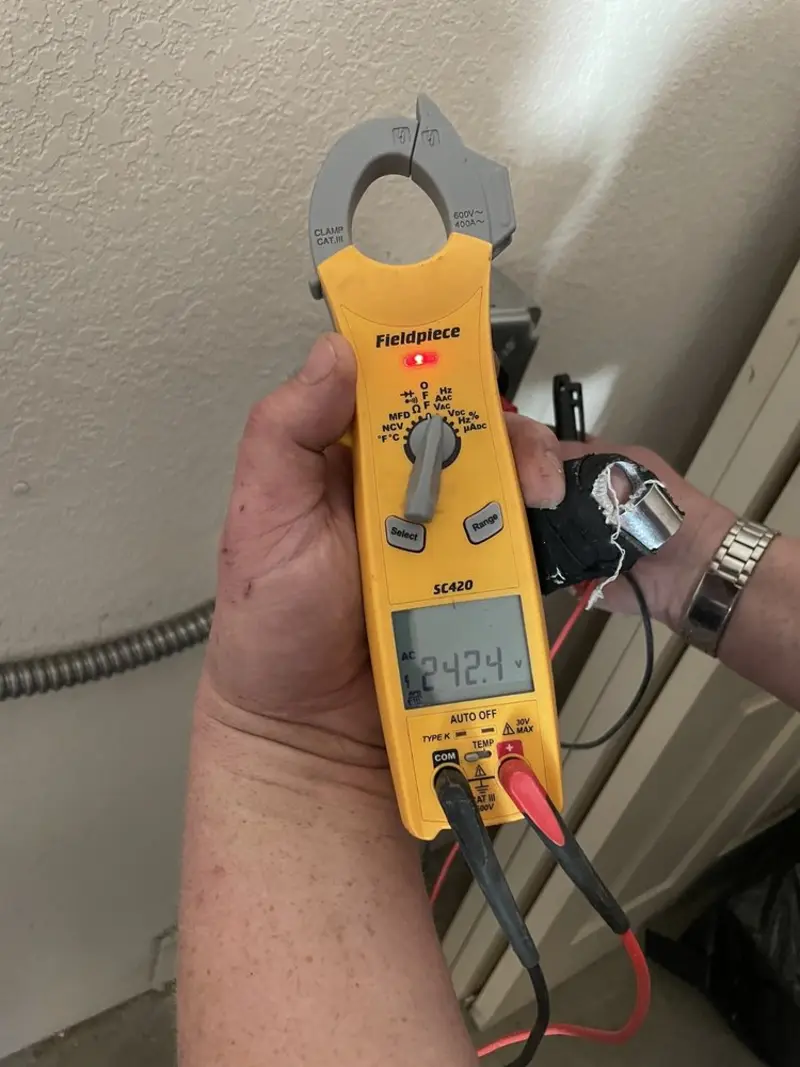 Voltage testing with clamp meter during Circuit Breaker Repair in Pueblo West